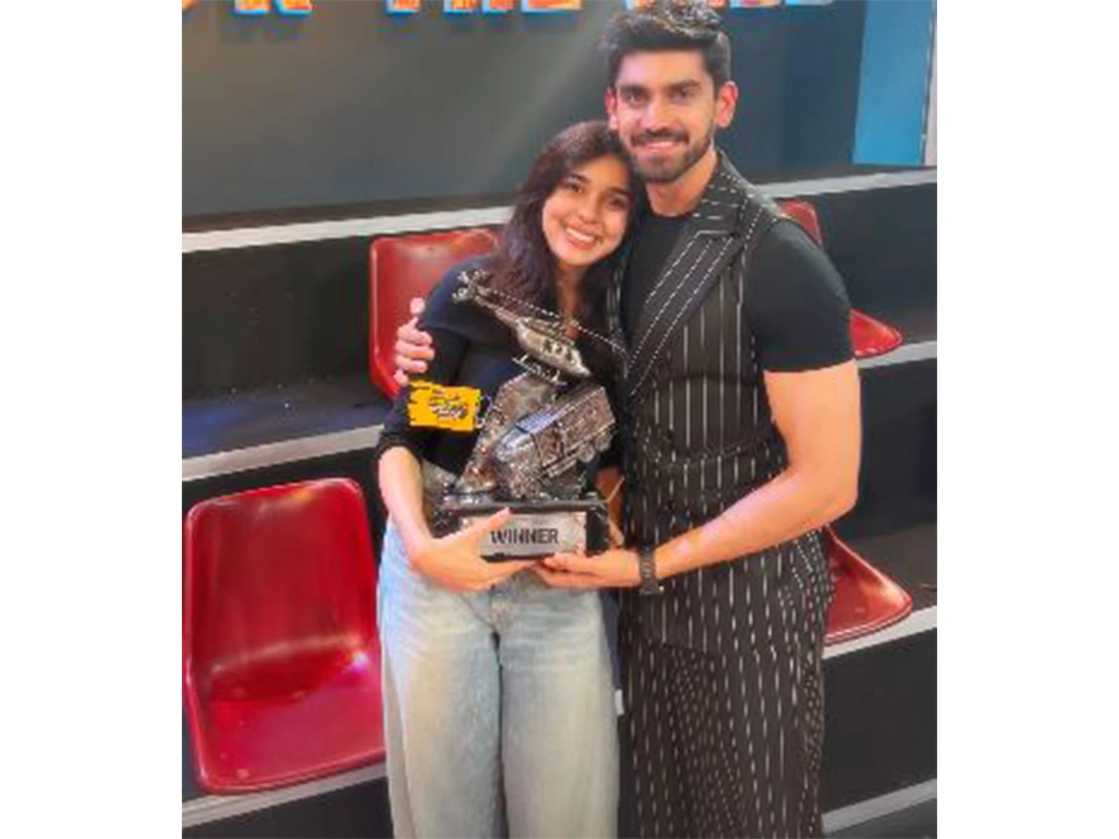 Avinash Mishra lifts the Khatron Ke Khiladi 15 trophy as Eisha Singh celebrates his emotional win